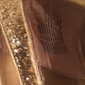 Women gold over 4” heals; worn only twice.